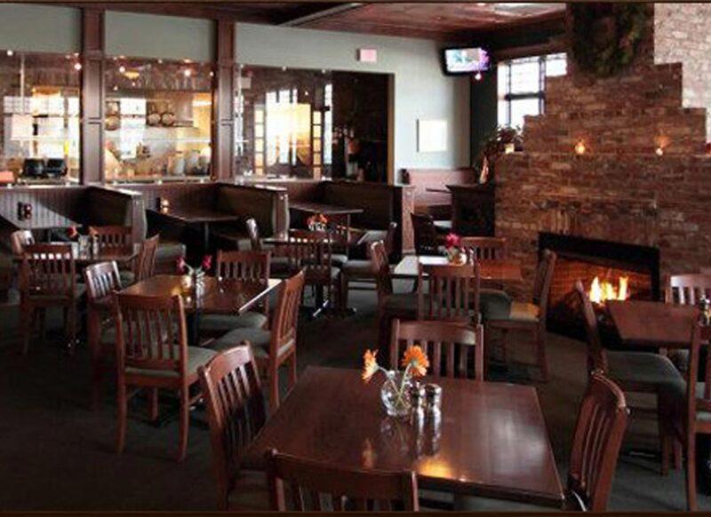 Green Parrot Dining Room & Fireplace